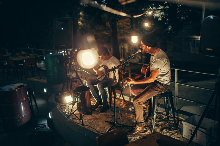 How can musicians take care of their mental health when performing?